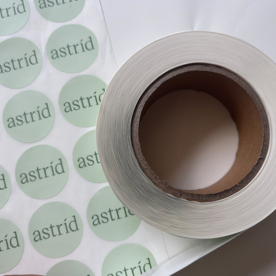 Las etiquetas autoadhesivas redondas de impresión adhesivas de la imagen de encargo del texto impermeabilizan el rollo de la etiqueta engomada del vinilo